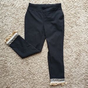 Black crop pants with fringe